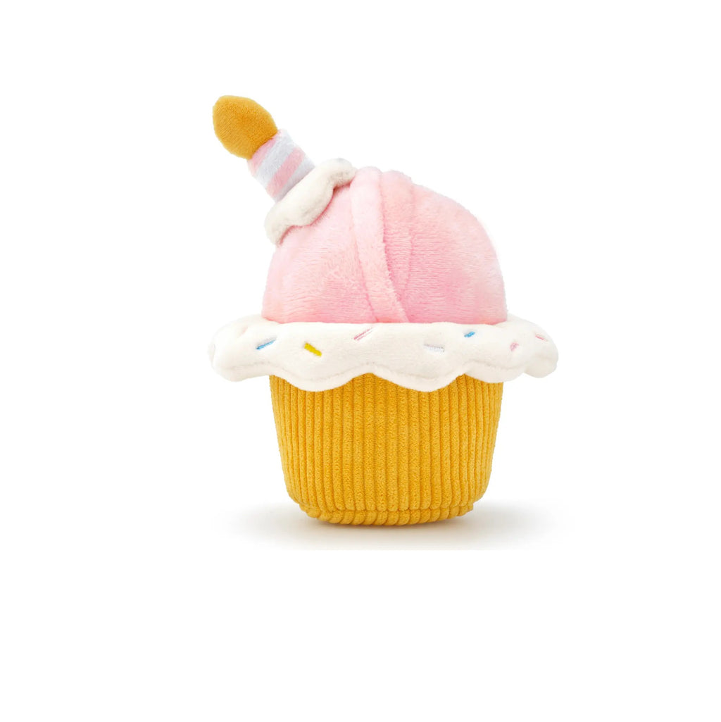Toy shaped like a cupcake with pink frosting and yellow base on a white background