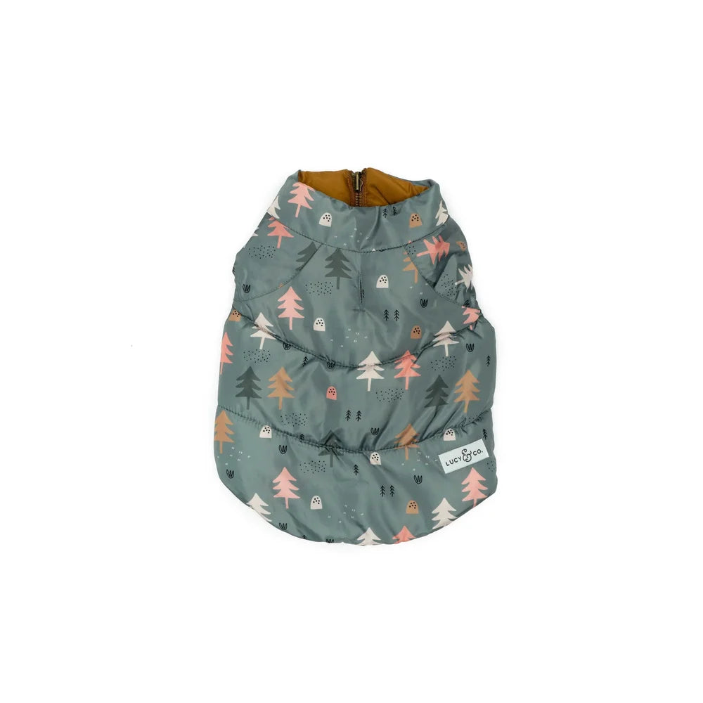 Dog puffer vest with forest pattern on a white background