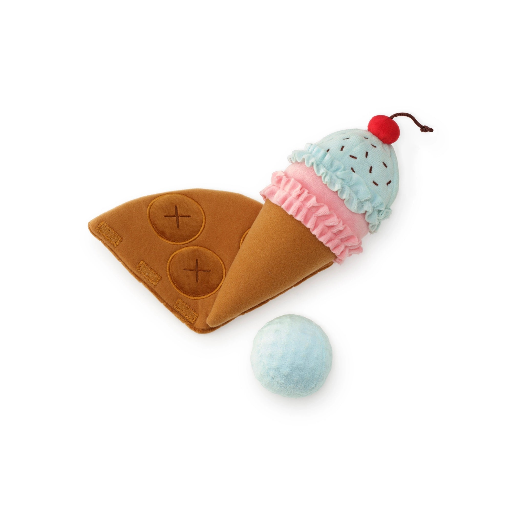 Toy resembling an ice cream cone with a cherry on top and a ball, on a white background