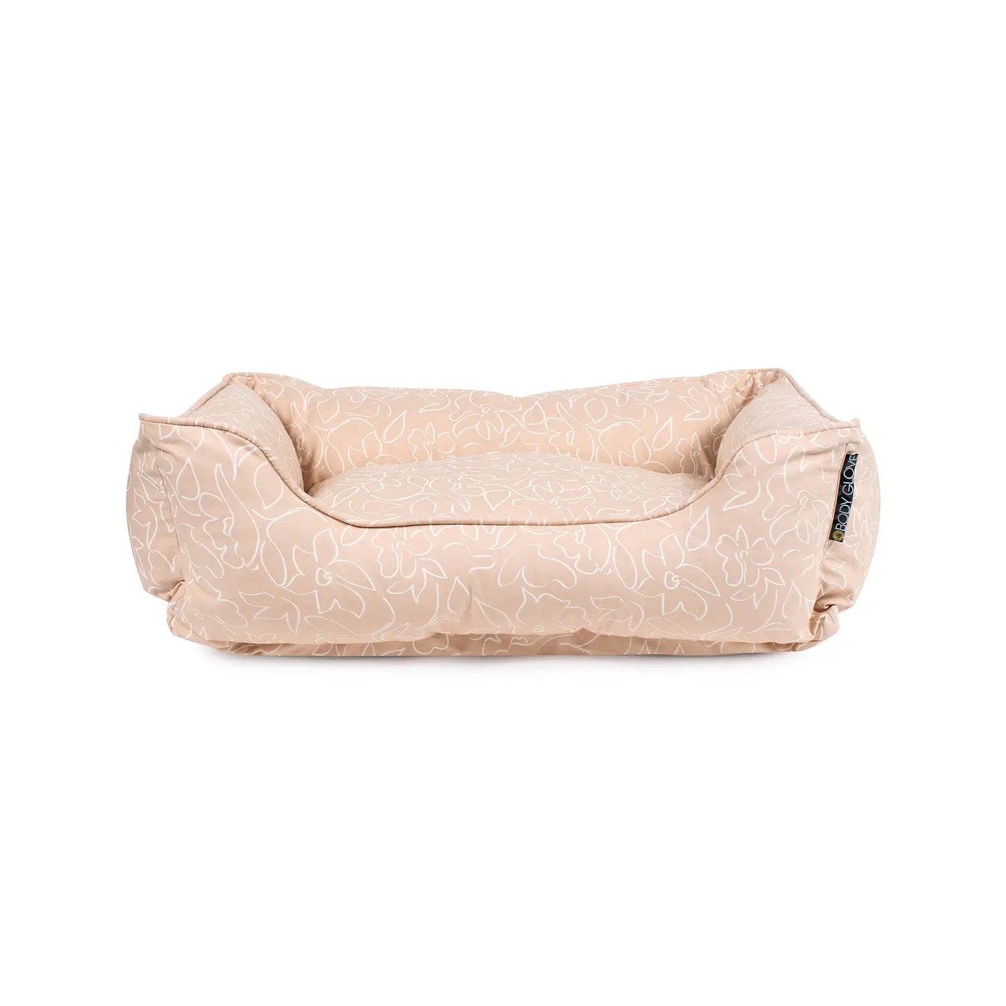 Beige dog bed with subtle pattern on a white background