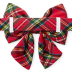Red plaid dog bow tie on a white background