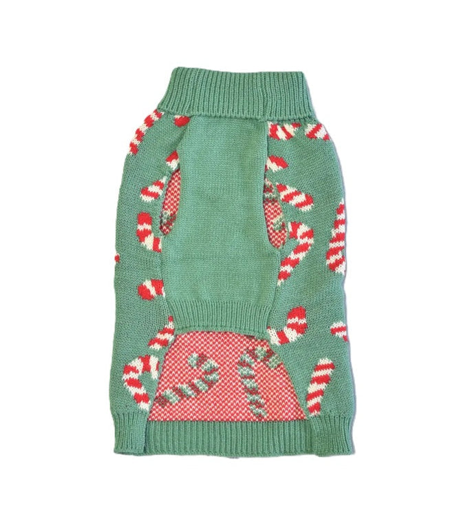 Green dog sweater with candy cane pattern on a white background