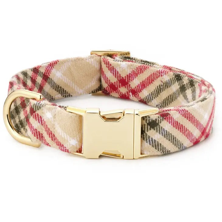 Plaid dog collar with gold buckle on a white background