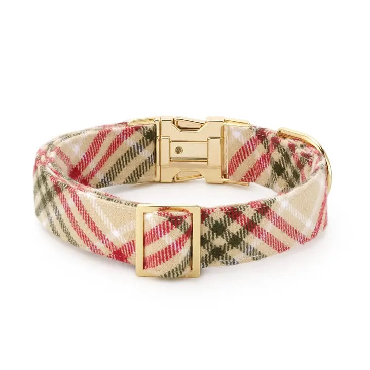 Plaid dog collar with gold buckle on a white background