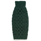 Green wool cable knitted dog sweater on a white background