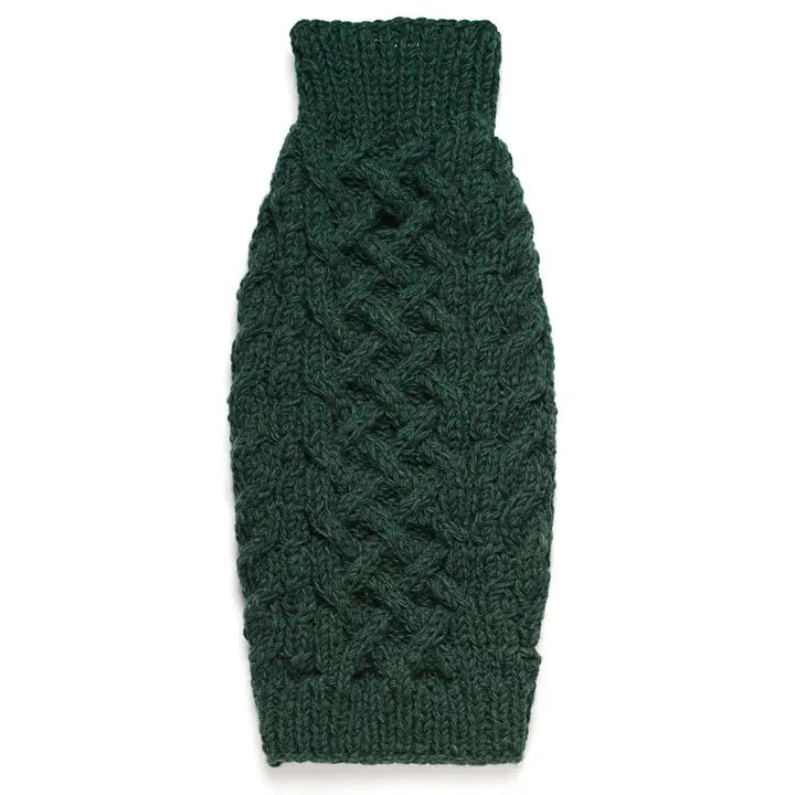 Green wool cable knitted dog sweater on a white background