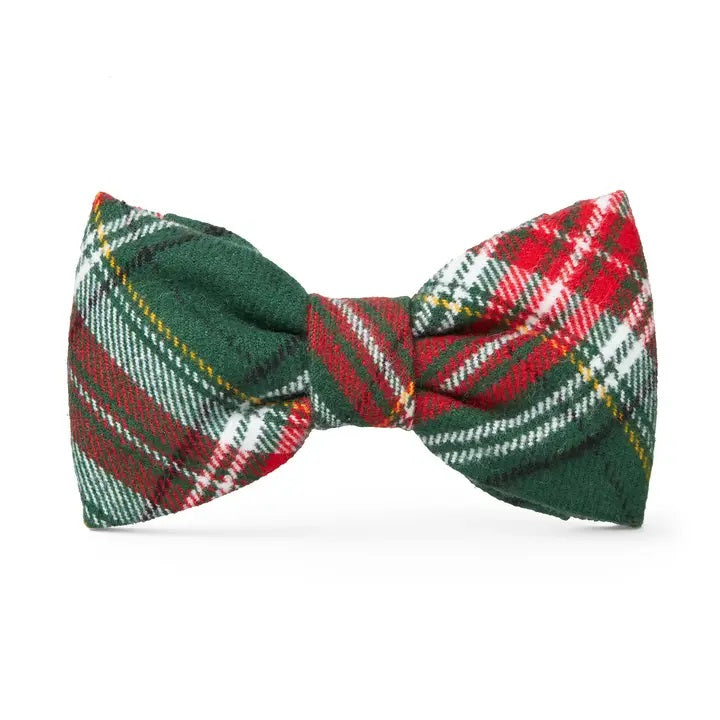 Plaid bow tie with red, green, and white pattern on a white background