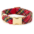 Plaid dog collar with gold buckle on a white background