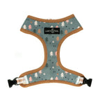 Dog harness with forest pattern and 'Lucy & Co.' branding on a white background