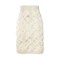 Wool ivory color cable knitted dog sweater on a white background